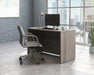 Teknik Affiliate 1200600 Desk in a Hudson Elm effect finish, two grommet holes for cord management