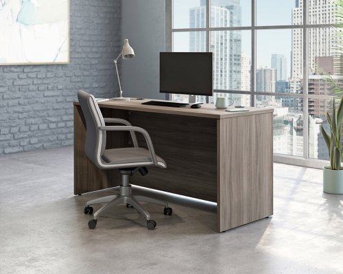Teknik Affiliate 1500600 Desk in a Hudson Elm effect finish, two grommet holes for cord management