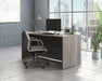 Teknik Affiliate 1500750 Desk in a Hudson Elm effect finish two grommet holes for cord management