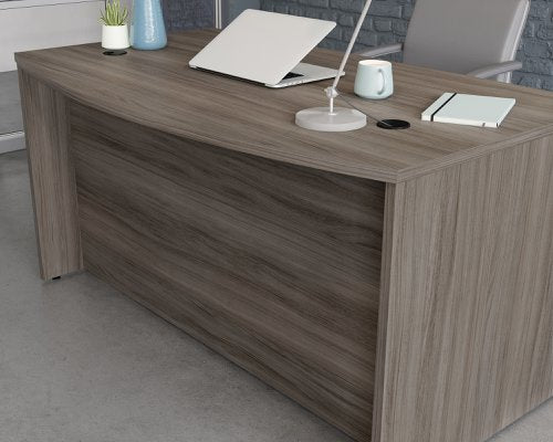 Teknik Affiliate 1500870 Bow Front Desk in a Hudson Elm effect finish two grommet holes for cord management - image 5