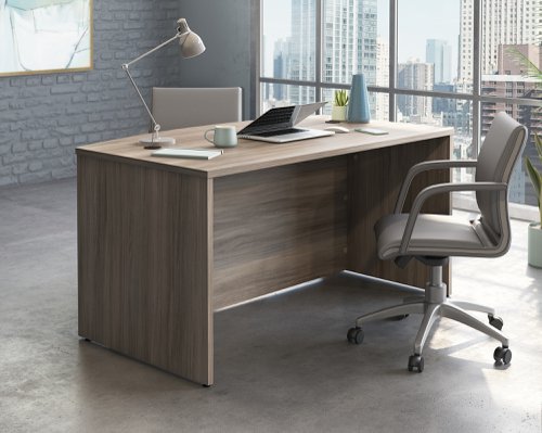 Teknik Affiliate 1500870 Bow Front Desk in a Hudson Elm effect finish two grommet holes for cord management