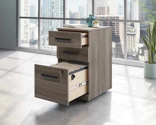 Teknik Affiliate 3 Drawer Mobile Pedestal in a Hudson Elm effect finish, two small drawers, one larger spacious filer lockable drawer - image 2