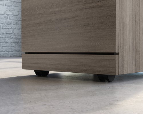 Teknik Affiliate 3 Drawer Mobile Pedestal in a Hudson Elm effect finish, two small drawers, one larger spacious filer lockable drawer - image 6